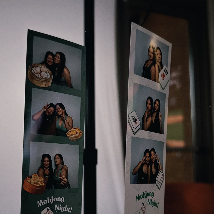 Two custom-themed photo booth strips displayed side by side