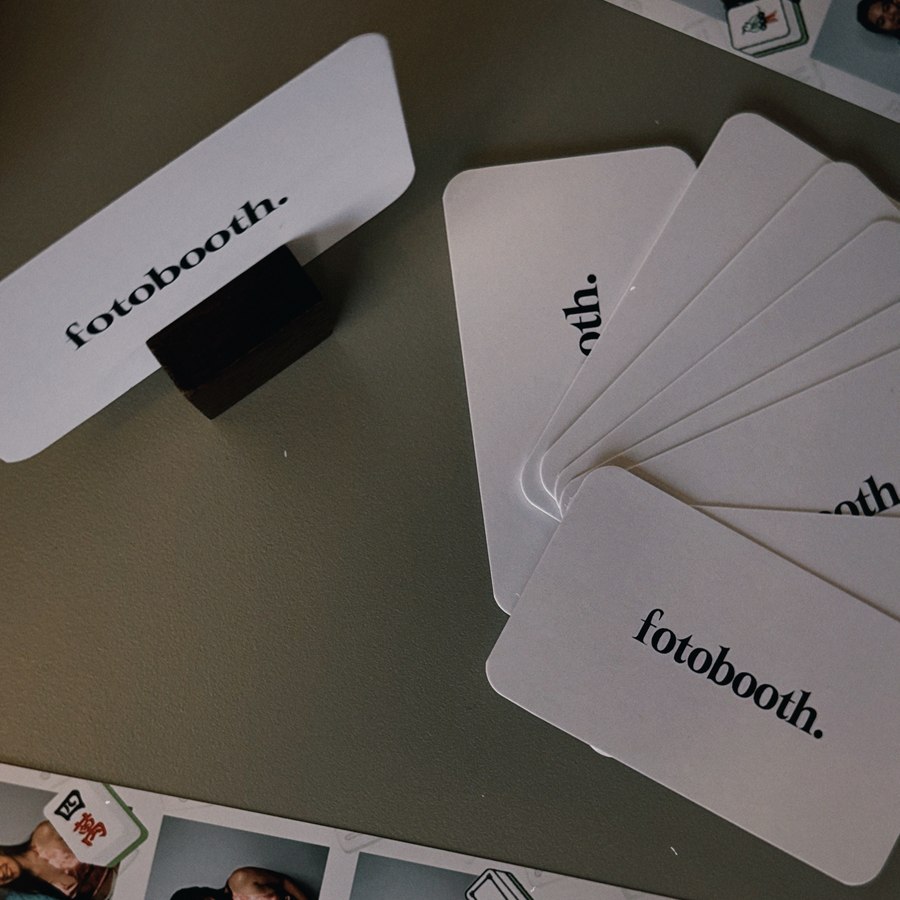 fotobooth branded cards and a printed photo strip